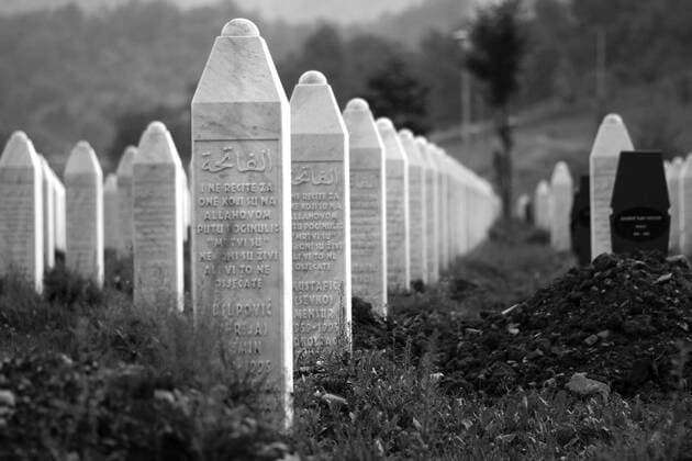 BOSNIA AND HERCEGOVINA , POTOCARI 26 07 2008 From 11th July 1995 in Srebrenica, the safe zone protected by UN forces Serbs killed in ethnic cleansing more than 8000 Bosniak man. Dozen years after the largest genocide in Europe since World War II mass graves are still being found and exhumed, in the mortuaries thousands of bodies await for identification, funerals take place, families of the victims wish to bury and mourn their relatives. HERE Cemetery in Potocari where the victims of the massacre are buried. EN_00922060_0053 