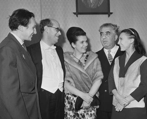 Moscow. USSR. Soviet and Russian conductor Mstislav Rostropovich greeted by guests. L-R: ballet dancer Alexander Lapauri, Mstislav Rostropovich, singer Galina Vishnevskaya, composer Aram Khachaturyan, and ballet dancer Raisa Struchkova.  TASS_455025