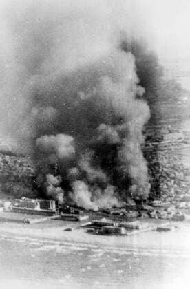 Port Said , Egypt : A dense column of black smoke , hundreds of feet high , hangs in the air over Port Said as building near the waterfront burn . Allied forces in control in Port Said , a cease fire had been called by Sir Anthony Eden . Britain has accepted the principle of AUN Police Force to take over . 7 November 1956 5 November 1956 Mono Negative UnitedArchives1221603