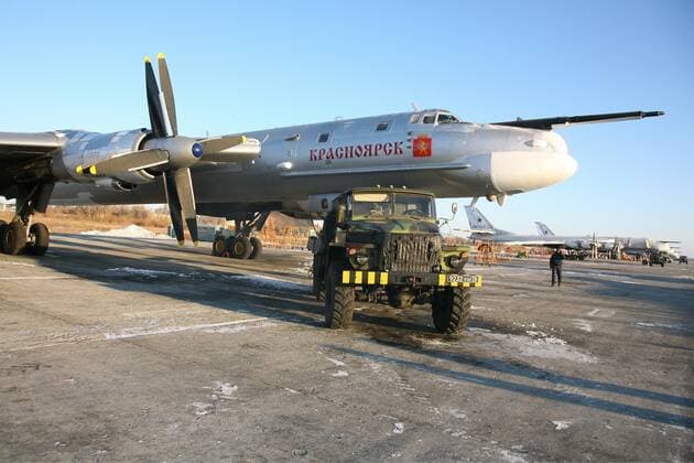 ITAR-TASS: SARATOV REGION, RUSSIA. DECEMBER 5, 2011. Tupolev Tu-95MC (NATO reporting name: Bear), a large, four-engine turboprop-powered strategic bomber, at the Engels Air Force Base (aka Engels-2, Engel s, or Zngyelse).  RE0F33A7
