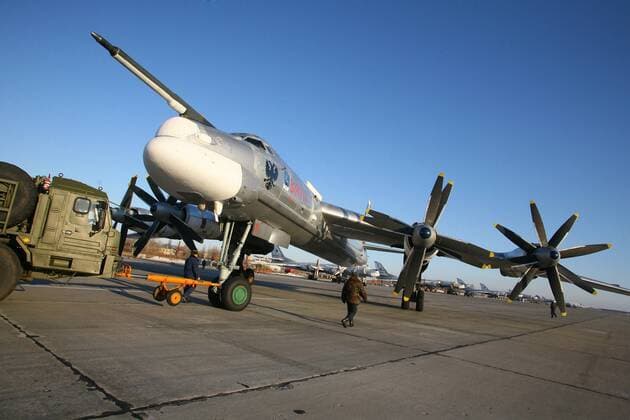 ITAR-TASS: SARATOV REGION, RUSSIA. DECEMBER 5, 2011. Tupolev Tu-95MC (NATO reporting name: Bear), a large, four-engine turboprop-powered strategic bomber, at the Engels Air Force Base (aka Engels-2, Engel s, or Zngyelse).  RE0F33A8