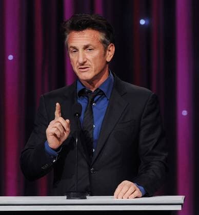Actor Sean Penn introduces the Medavoy family to present the Danny Kaye Humanitarian Award during the UNICEF Ball, at the Beverly Wilshire Hotel in Beverly Hills, California on December 8, 2011. Queen Noor was recognized as a UNICEF Woman of Compassion.  LAP2011120861