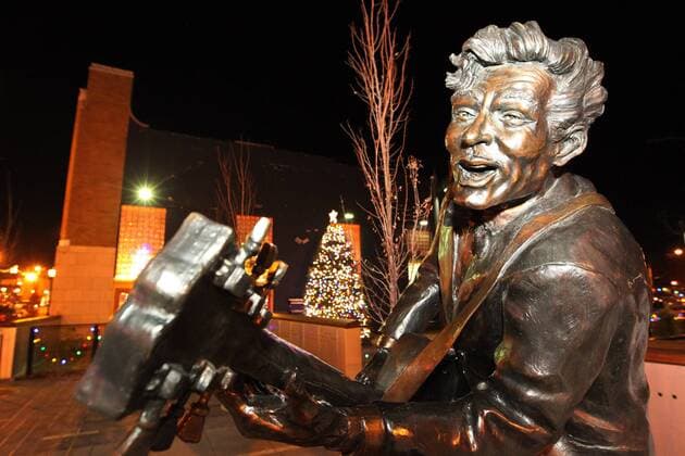 The Chuck Berry statue stands near a Christmas tree in the Delmar Loop in University City, Missouri on December 17, 2011.  SLP2011121708