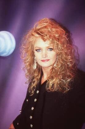 Bonnie Tyler 10 94 kri Frau Gesang Musik Pop hoch halb neutral rothaarig Locken Anzug seriös