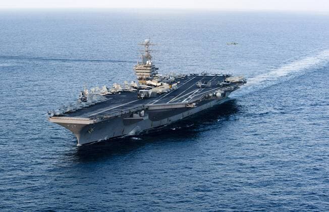 The Nimitz-class aircraft carrier USS Abraham Lincoln (CVN 72) is shown in the Arabian Sea on January 19, 2012, before transiting through the Strait of Hormuz without incident on January 22, 2012. The EU banned oil purchases from Iran on January 23, 2011. Iran has said it may blockade the Strait of Hormuz, but the U.S. Fifth Fleet has said it will not allow this to happen.  WAX20120123102
