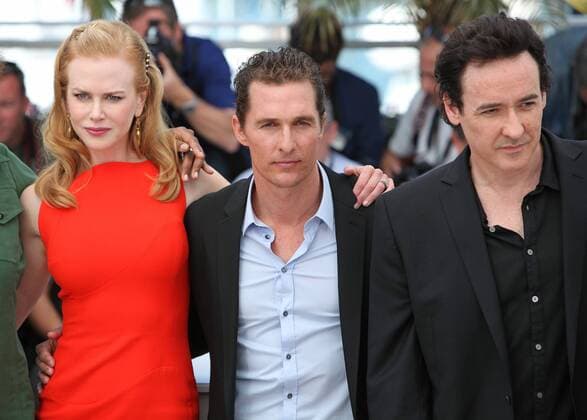 Nicole Kidman (L), Matthew McConaughey (C) and John Cusack arrive at a photocall for the film The Paperboy during the 65th annual Cannes International Film Festival in Cannes, France on May 24, 2012.  CAN20120524739