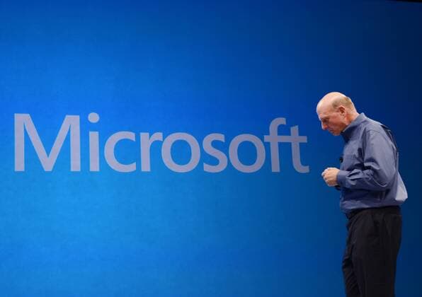Microsoft CEO Steve Ballmer shows the new tablet called Surface during a news conference at Milk Studios in Los Angeles on June 18, 2012. The new Surface tablet utilizes a 10.6 inch screen with a cover that contains a full multitouch keyboard.  LAP2012061806