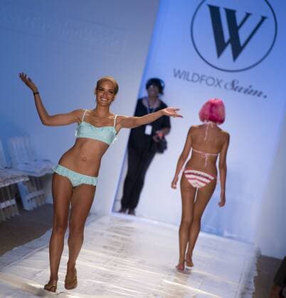 A model during show rehearsal presents a swim suit creation by Wildfox Swim fashion designer during the Mercedes-Benz Fashion Week Swim 2013 at the Raleigh hotel, MIami Beach, Florida, July 23, 2012.  MIA20120723105