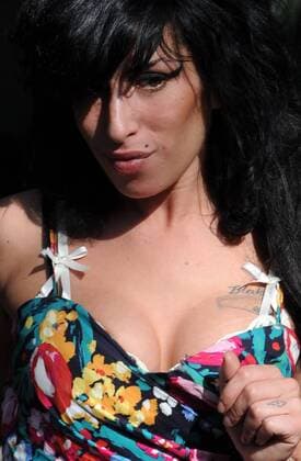 Amy Winehouse leaves the City Of Westminister Magistrates Court, London, she is accused of punching one of her fans, London, March 17, 2009. AndrewxParsons i-Images  AJP