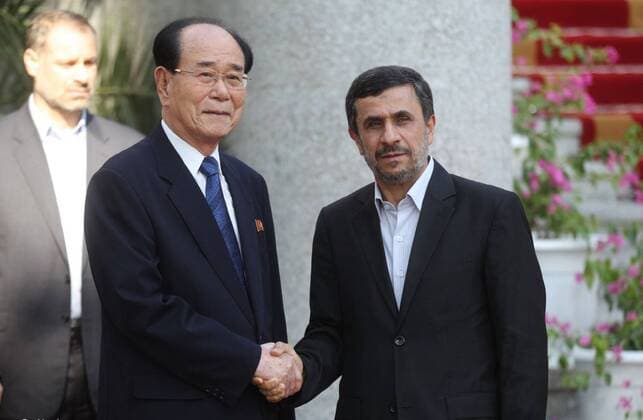 (120901) -- TEHRAN, Sept. 1, 2012 (Xinhua) -- Iranian President Mahmoud Ahmadinejad (R) shakes hands with Kim Yong Nam, president of the Presidium of the Supreme People s Assembly of the Democratic People s Republic of Korea, in Tehran, Iran, Sept. 1, 2012. (Xinhua Iran s Presidential Office) (cl) IRAN-DPRK-AHMADINEJAD-KIM YONG NAM-MEET 