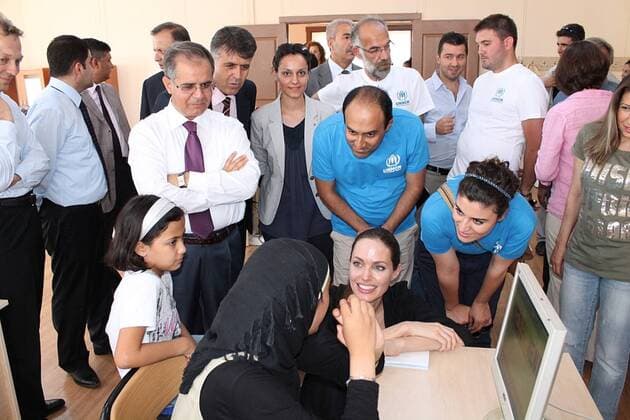 Actress and UN special envoy Angelina Jolie arrives with UN High Commissioner for Refugees Antonio Guterres on September 13, 2012 at a refugee camp in the southeastern Turkish city of Kilis to meet Syrian refugees. Jolie visited the Oncupinar camp with some 12,000 refugees, Turkey s largest camp for Syrian refugees near the border. 