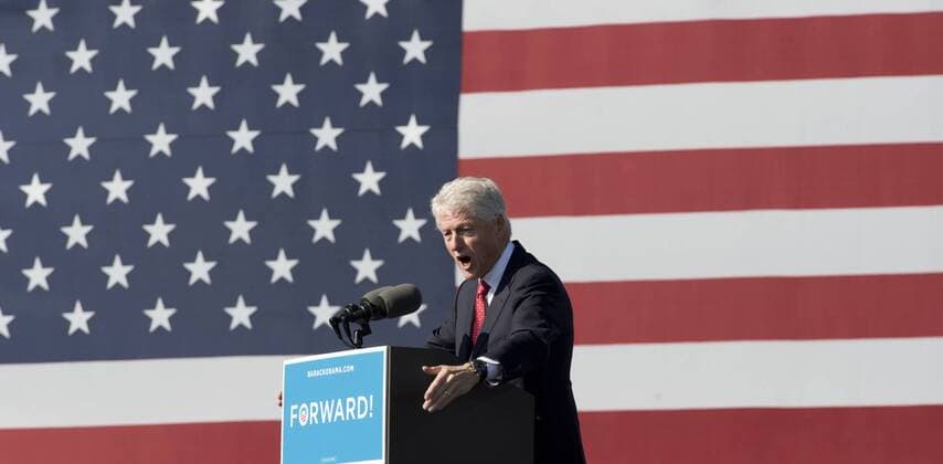 Former U.S. President Bill Clinton delivers remarks to grassroots supporters at Memory Mall at the University of Central Florida, Orlando, Florida on October 29, 2012 after President Barack Obama announced that he is canceling campaign events and returning to the White House to monitor the preparations for early response to Hurricane Sandy.  MIA20121029105