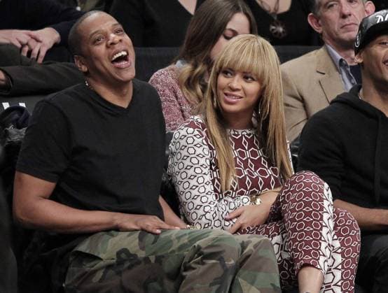 Jay-Z and Beyonce Knowles watch the Brooklyn Nets play the Toronto Raptors in the first regular season game ever for the Nets at the Barclays Center in New York City on November 3, 2012.  NYP201210203153