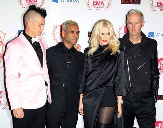 (From L to R) Drummer Adrian Young, bassist Tony Kanal, singer Gwen Stefani and guitarist Tom Dumont of No Doubt arrive on the red carpet at the MTV Europe Music Awards in Frankfurt, Germany on November 11, 2012.  FRA20121111728