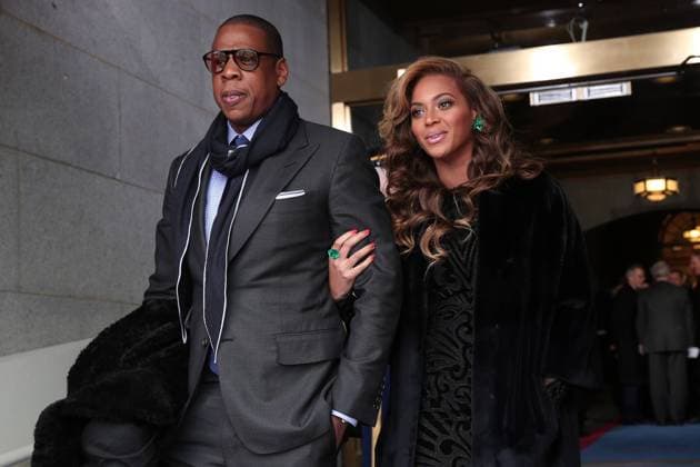 Recording artists Jay-Z and Beyonce arrive before the presidential inauguration on the West Front of the USA Capitol January 21, 2013 in Washington, DC.  WAX20130121026
