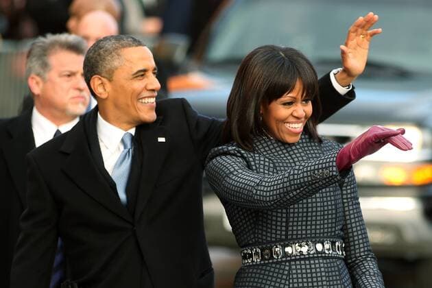 Berühmte Feministinnen, Michelle Obama President Barack Obama and First Lady Michelle Obama wave during the Inaugural Parade after his public inauguration ceremony in Washington, D.C. on January 21, 2013.  WAX20130121170