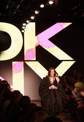 (130210) -- NEW YORK, Feb. 10, 2013 (Xinhua) -- Designer Donna Karan receives applauds after the presentation of the DKNY 2013 Fall collections at the Mercedes-Benz Fashion Week in New York, Feb. 10, 2013. (Xinhua Zhai Xi) U.S.-NEW YORK-FASHION WEEK-DKNY 