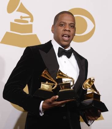 Jay-Z appears backstage with the Grammys he won at the 55th Grammy Awards at the Staples Center in Los Angeles on February 10, 2013.  LAP20130210283