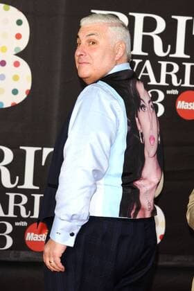Mitch Winehouse and wife arrives for the Brit Awards 2013 at the O2 Arena, Greenwich, London. Mitch Winehouse 
