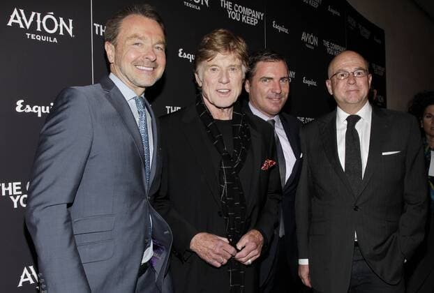 Michael Clinton, Robert Redford, Jack Essig and David Granger arrive on the red carpet at the premiere of The Company You Keep at MoMA in New York City on April 1, 2013.  NYP20130401194