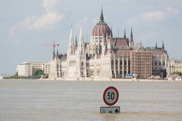 BUDAPEST, June 09, 2013 - A traffic sign is seen in the flooding Danube in central Budapest, capital of Hungary, June 9, 2013. The water level of the Danube river stood at 8.91 meters in Budapest Sunday night, 0.31 meters more than the record high in 2006.(Xinhua Attila Volgyi) (yc) HUNGARY-BUDAPEST-DANUBE LEVEL-RECORD HIGH 