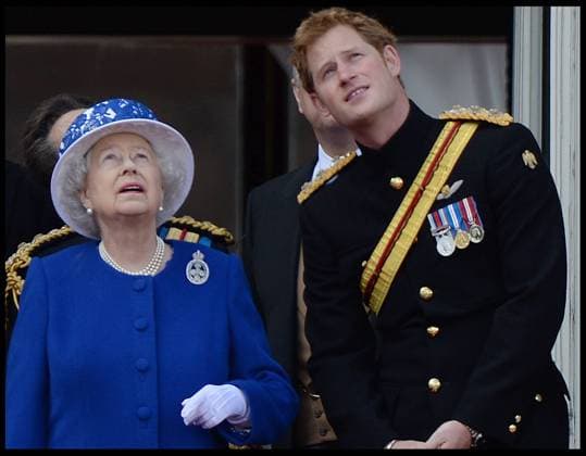 Queen Elizabeth II with Prince Harry watch the fly past on the Balcony of Buckingham Palace during Trooping The Colour, London, United Kingdom, Saturday, 15th June 2013 Picture by Andrew Parsons i-Images AndrewxParsonsx xi-Images  IIM-0100-0104