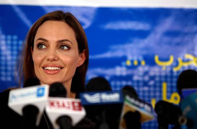 (130621) -- MAFRAQ, June 20, 2013 (Xinhua) -- Actress Angelina Jolie, the U.N. refugee agency s special envoy, speaks to the media during a news conference at the Al Zaatri refugee camp, in the Jordanian city of Mafraq, near the border with Syria, June 20, 2013, the World Refugee Day. The refugee camp is hosting Syrians displaced by the country s domestic conflict. (Xinhua Mohammad Abu Ghosh) JORDAN--MAFRAQ--WORLD REFUGEE DAY 