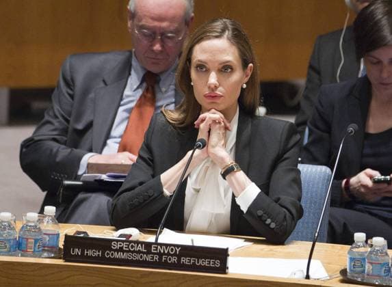 Actress Angelina Jolie (R), Special Envoy to the United Nations High Commissioner for Refugees, speaks during a meeting of the United Nations Security Council on Women and Peace and Security and Sexual Violence in Conflict at the United Nations Headquarters in New York City on June 24, 2013. UN Photo Rick Bajornas  NYX20130624104