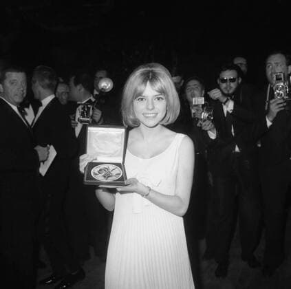 The Winner and the award Naples, Italy: March 21st picture of Luxembourg s 17-year-old France Gall , Holding her award after winning the Eurovision Song Festival at the Naples Rai-Auditorium. 22nd March 1965, Napoli, Neapel, Luxemburg UnitedArchives00119996 