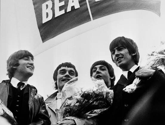 The Beatles are pictured on their arrival here , June 4th , for concerts. Left to right: John Lennon ; Drummer Jimmy Nicol replacing hospitalized Ringo Starr ; Paul McCartney and George Harrison . Tomorrow the Beatles return to London after concerts in Holland to fly out to Hong Kong and Australia - June 6th 1964 Â UnitedArchives00134369 