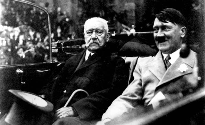Adolf Hitler, the German Chancellor, rides through Berlin with Hindenburg, May Day 1st May 1933. UnitedArchives00337875 