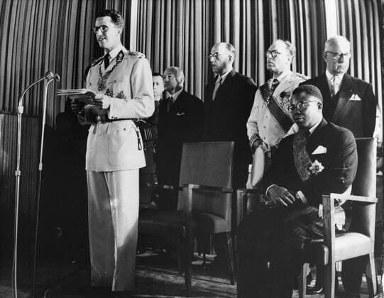 King Baudouin of Belgium speaking at the Independence Celebrations in Leopoldville on 30th June 1960 when the Belgian Congo became an independent country. On the right is Mr Kasavubu , the first Preisdent of the Congo, Belgien UnitedArchives00413771 