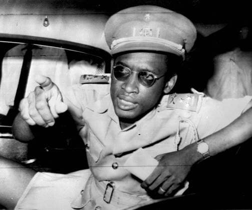 Colonel Joseph Mobutu Chief of the Congolese army getting into a car after he announced that the army had taken over in the Congo from Patrice Lumumba and will be in charge until the 31st Decmeber. Leopoldville - 15th September 1960 UnitedArchives00498169 