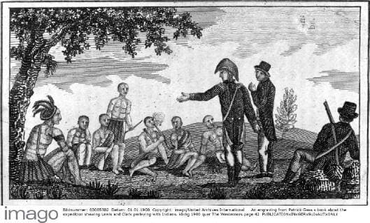 An engraving from Patrick Gass s book about the expedition showing Lewis and Clark parleying with Indians. UnitedArchives00905734 