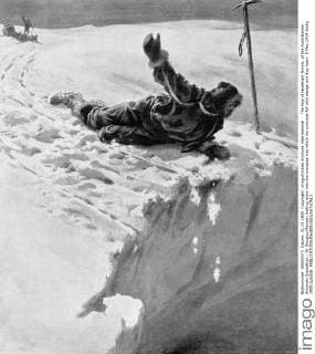 The loss of lieutenant Ninnis, of the Australasian Antarctic Expedition : Dr Douglas Mawson looking down into the crevasse into which his comrade fell with sledge and dog-team. 9 May 1914 UnitedArchives00927240 