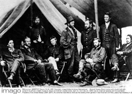 General Ulysses Grant (centre with slouch hat) with some of his pfficers in1864 Ulysses S. Grant (born Hiram Ulysses Grant, April 27, 1822 July 23, 1885) was an American general and the eighteenth President of the United States (1869 -1877). He achieved international fame as the leading Union general in the American Civil War, capturing Vicksburg in 1863 and Richmond in 1865. He accepted the surrender of his Confederate opponent Robert E. Lee at Appomattox Court House. UnitedArchives00930356 