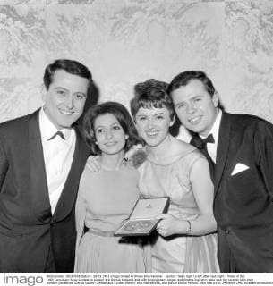 London: Seen right to left after last night s finals of the 1963 Eurovision Song Contest in London are Danish husband and wife singing team Jorgen and Grethe Ingmann, who won the contest with their number Dansevise (Dance Sound) Switzerland s Ester Ofarim, who was second, and Italy s Emilio Pericoli, who was third. 24 March 1963 UnitedArchives00937101 
