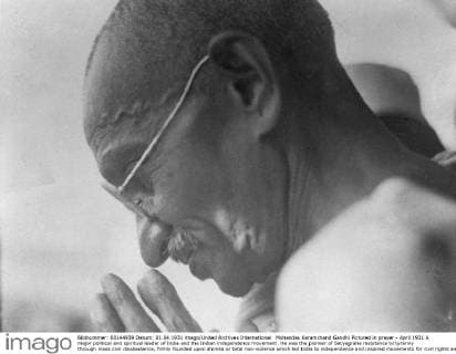 IMAGO ICONS: Mahatma Gandhi Mohandas Karamchand Gandhi Pictured in prayer - April 1931 A major political and spiritual leader of India and the Indian independence movement. He was the pioneer of Satyagraha resistance to tyranny through mass civil disobedience, firmly founded upon ahimsa or total non-violence which led India to independence and inspired movements for civil rights and freedom across the world. Gandhi is commonly known in India and across the world as Mahatma Gandhi Credit: TopFoto.co.uk  UnitedArchives00939001