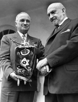 President Truman receiving the Holy Scroll from Dr Chaim Weizmann on the steps of the White House , as the President of the new State of Israel makes a formal visit to America s chief Executive. 29th May 1948  UnitedArchives00939901