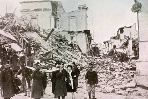 The King and Queen of Italy assisting in the rescue of victims of the Earthquake 1909 THE year 1909 opened blackly for Italy, and the whole world was horror-struck at the- news of the terrible earthquake which had overwhelmed the town of Messina in Sicily, and of Reggio on the mainland. The loss of life was enormous. In Messina alone it is computed that over 100,000 perished. The town was completely ruined, and weeks elapsed before the search parties had completed their labour. Remarkable escapes were recorded : in some instances the members of a family were entombed among the wreckage of fallen buildings for many days. The King and Queen of Italy set a noble example of personal service for the sufferers, travelling down to the scenes of the catastrophe and assisting the Red Cross Societies with the work of rescue. Sympathy was extended to the stricken country from the whole of the ci  UnitedArchives00943226