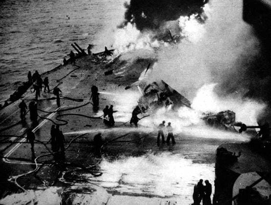 Japanese suicide planes blazing on the flight deck of US aircraft carrier Saratoga, hit seven times during an action off Iwojima Â  UnitedArchives01017863
