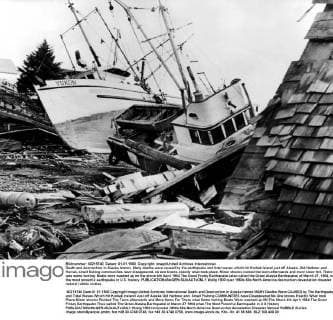 Death and destruction in Alaska tremor. Many deaths were caused by the earthquake and tidal waves which hit Kodiak Island just off Alaska. Old Harbour and Korluk, small fishing communities have disappeared, no one knows exactly what took place. Minor shocks rocked the town afterwards and more snow fell. There was some looting. Boats were washed up on the shore 4th April 1964 The Good Friday Earthquake (also called the Great Alaska Earthquake) of March 27, 1964, was the most powerful earthquake in U.S. history.  UnitedArchives01018015