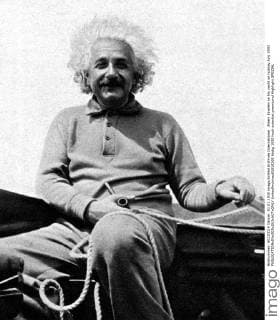 Albert Einstein on his yacht on holiday July 1930  UnitedArchives01018269