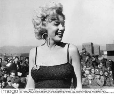 IMAGO ICONS: Marilyn Monroe Marilyn Monroe entertaining the troops in Korea 23rd February 1954 Monroe, Marilyn (orig. Norma Jean Baker, nee Mortenson) US actress; starred in movie The Seven Year Itch 1956; sang Happy Birthday to John F. Kennedy at Madison Square Garden 1962; wife of Joe DiMaggio 1954 (divorced 1954); wife of Arthur Miller 1956 (divorced 1961) _1926-1962  UnitedArchives01022831