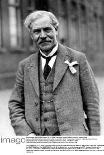 Ramsay MacDonald s winning smile after his election. Note the election rosette is his buttonhole. He was photographed at Seaham Harbour, Durham after his victory. 15th March 1929  UnitedArchives01026969