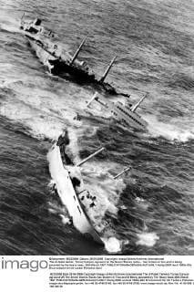 The ill-fated tanker, Torrey Canyon, aground on the Seven Stones rocks... has broken in two and is being pounded by the heavy seas. 28th March 1967  UnitedArchives01029553
