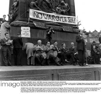 An Egyptian mathematician who is employed as a senior lecturer in London Dr A Anis , speaks to the crowds at Trafalgar Square during a mass rally in protest No War Over Suez . Many members of Parliament spoke from the platform at the meeting as well . 16th September 1956  UnitedArchives01188157