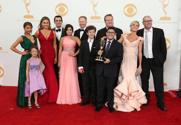 (L-R) Actors Sarah Hyland, Aubrey Anderson-Emmons, Sofia Vergara, Ty Burrell, Jesse Tyler Ferguson, Ariel Winter, Eric Stonestreet, Nolan Gould, Rico Rodriguez, Julie Bowen and Ed O Neill appear backstage at the 65th Primetime Emmy Awards at Nokia Theatre in Los Angeles on September 22, 2013.  LAP20130922254