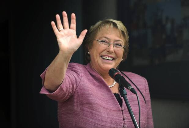 Michelle Bachelet waves to her supporters at a polling station in Santiago, capital of Chile, on Nov. 17, 2013. Michelle Bachelet, candidate of the opposition center-left New Majority coalition and ex-president, won Chile s presidential elections Sunday, the Electoral Service announced. (Xinhua Jorge Villegas) CHILE-SANTIAGO-POLITICS-ELECTION-BACHELET 
