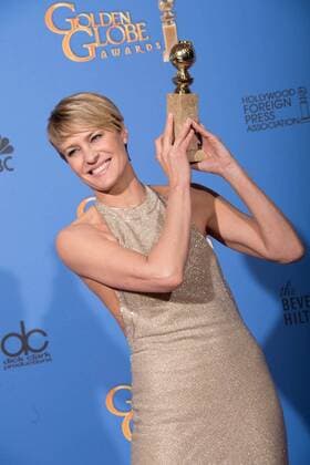 71st ANNUAL GOLDEN GLOBE AWARDS - 2014 Press Room BEVERLY HILLS USA After winning the category of BEST PERFORMANCE BY AN ACTRESS IN A TELEVISION SERIES ? DRAMA for her role in ?HOUSE OF CARDS?, actress Robin Wright poses backstage in the press room with her Golden Globe Award at the 71st Annual Golden Globe Awards at the Beverly Hilton in Beverly Hills, CA on Sunday, January 12, 2014.  UnitedArchives20162822